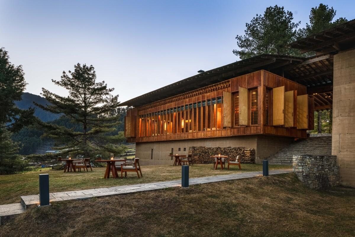 Amankora lodge exterior at dusk with outdoor dining terrace