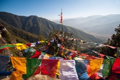 Prayer flags on a Himalayan ridge in Bhutan