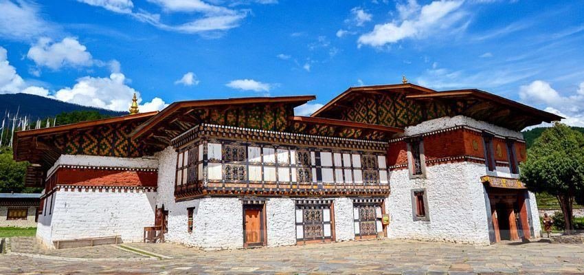 Traditional dzong architecture under a blue sky