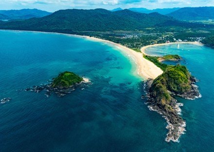 Aerial view of the twin bays and headland at Nacpan Beach, El Nido