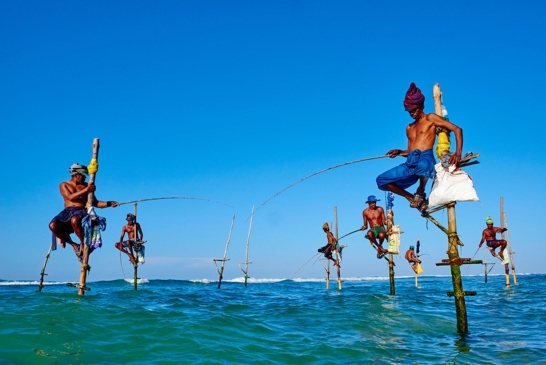 Traditional stilt fishermen
